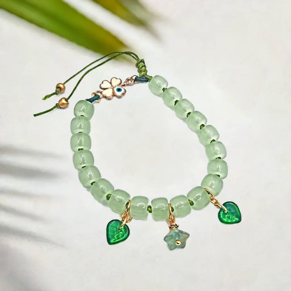 Green adjustable beaded Bracelet Evil eyes 4 leaves