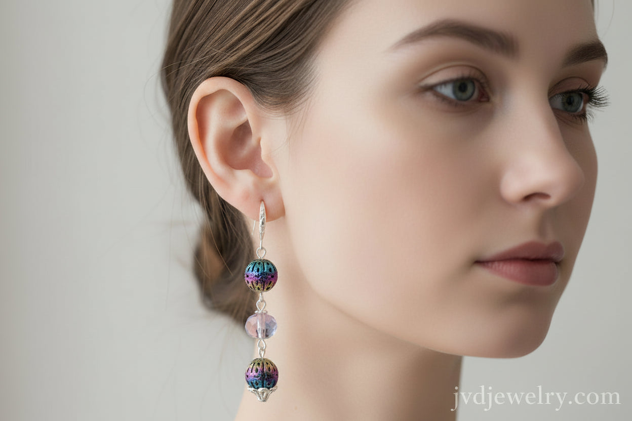 Multicolored beaded earrings on a brown card with a dark background