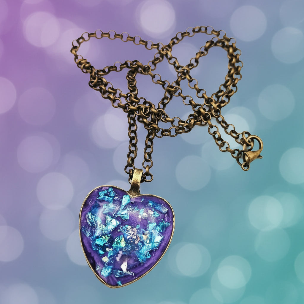 Necklace with a heart-shaped purple pendant on a white background