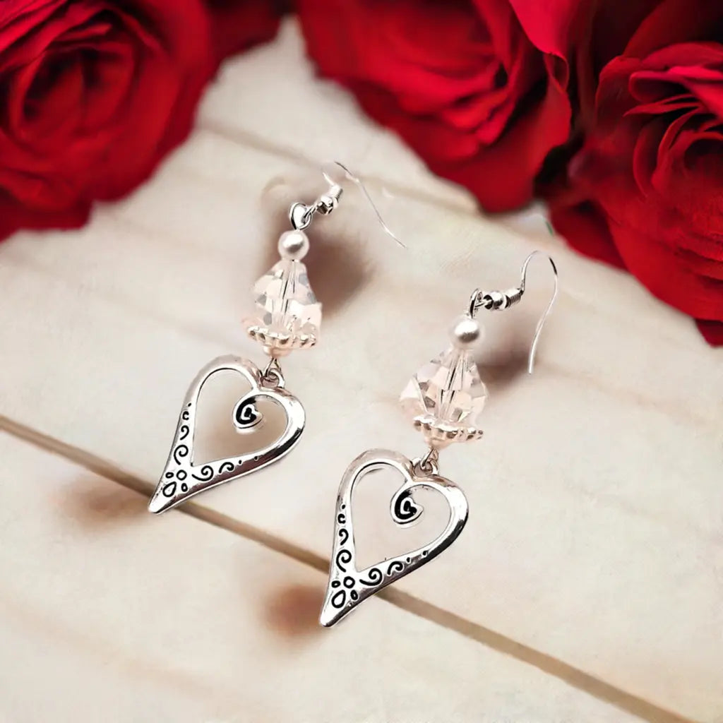 Silver heart pearlized Lucite earrings more color