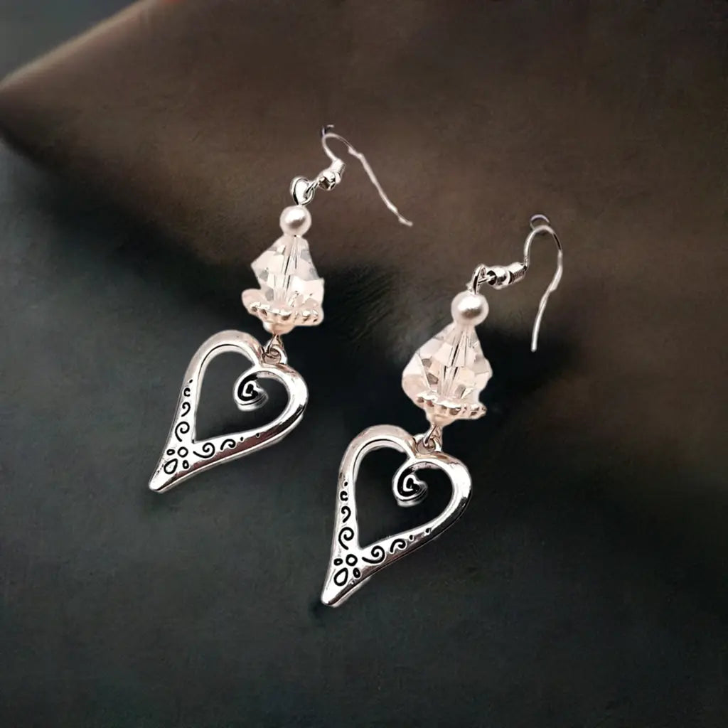 Silver heart pearlized Lucite earrings more color
