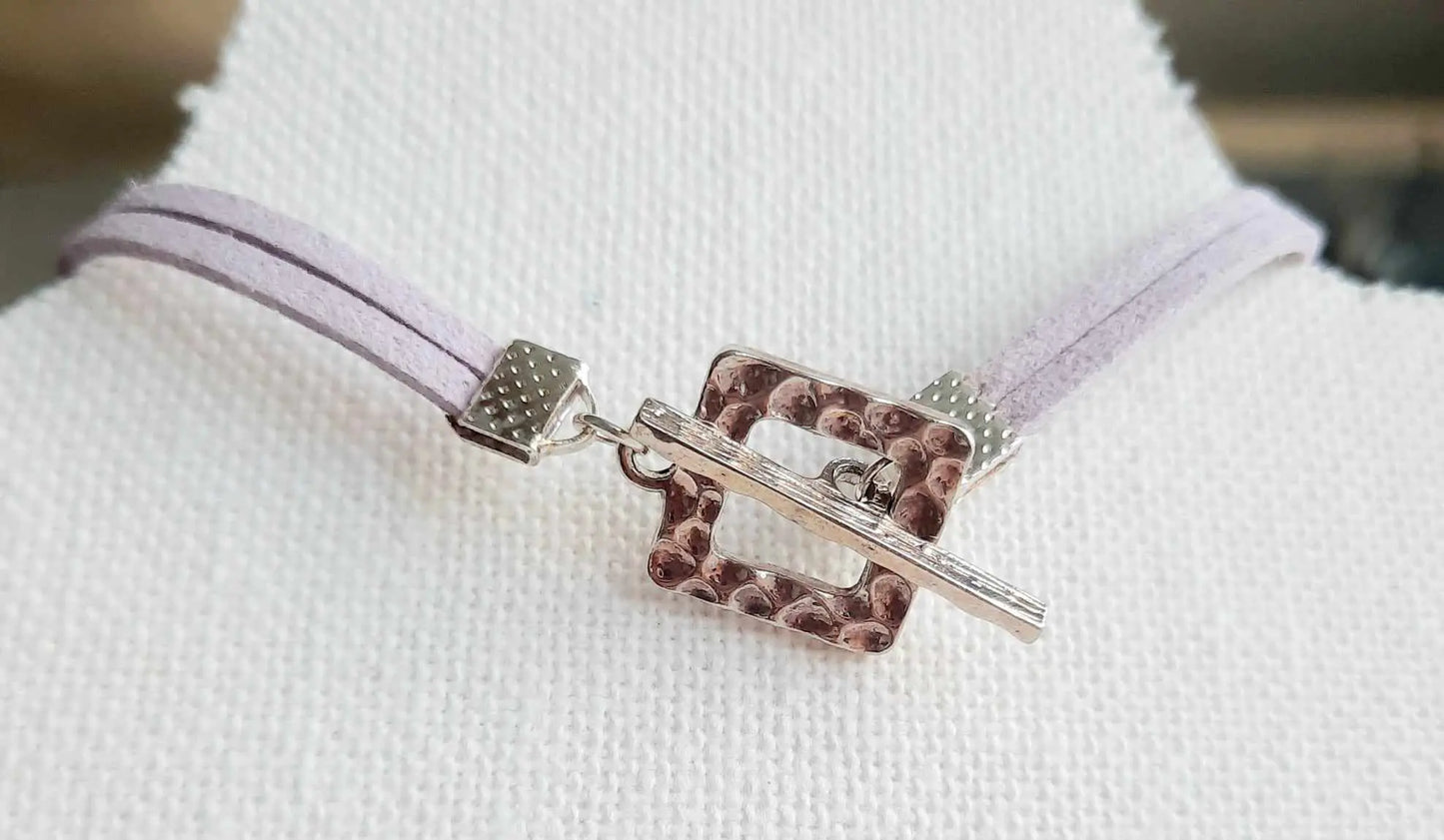 Light purple faux suede rainbow heart bracelet