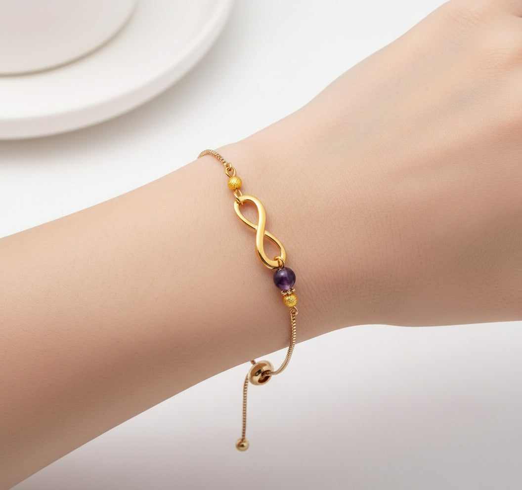 Gold Infinity Bracelet with purple amethyste