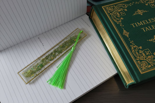 Decorative bookmark with tassel on an open notebook