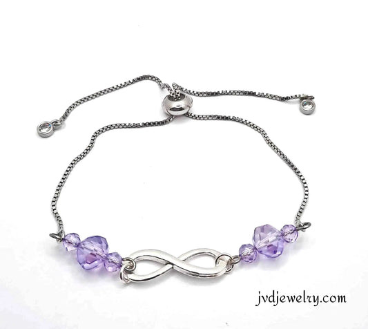 Alloy shiny silver infinity bracelet purpe crystals - Image #1