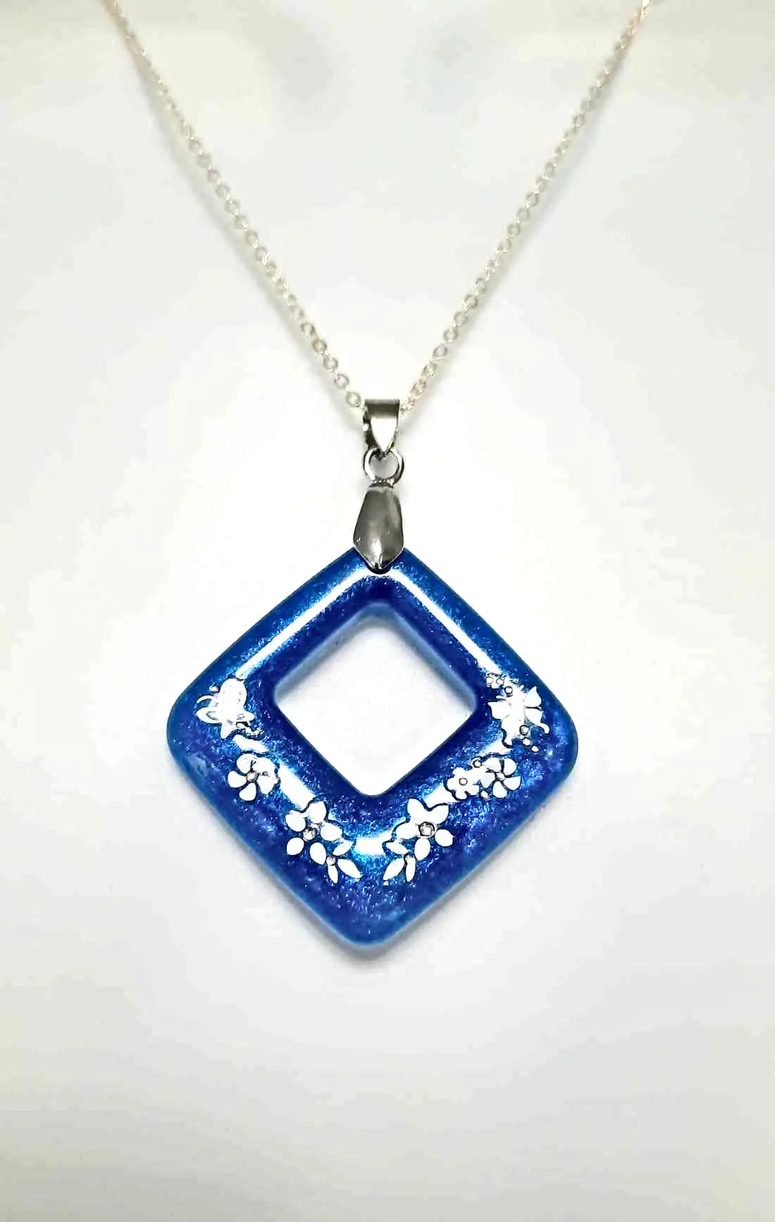 Blue Resined white flower necklace by Josie - Image #1