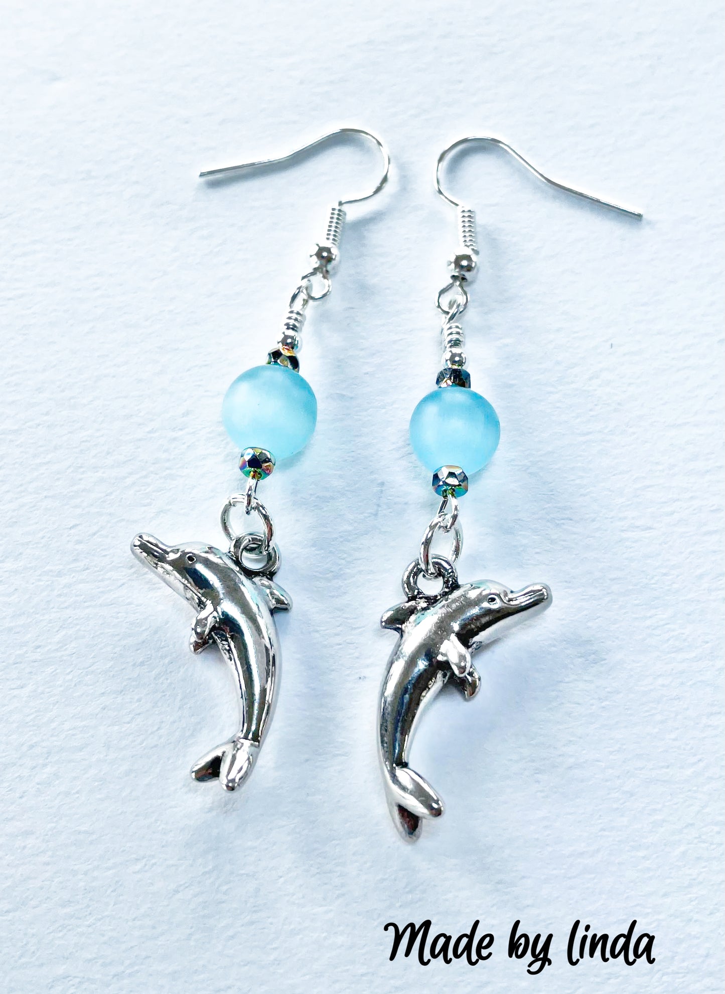 Silver dolphin charm Earrings