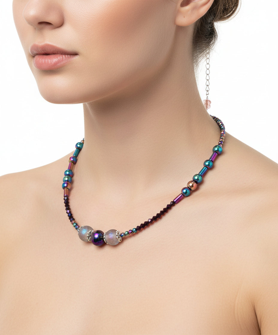 Colorful beaded necklace on a white background with JVDJewelry.com branding.