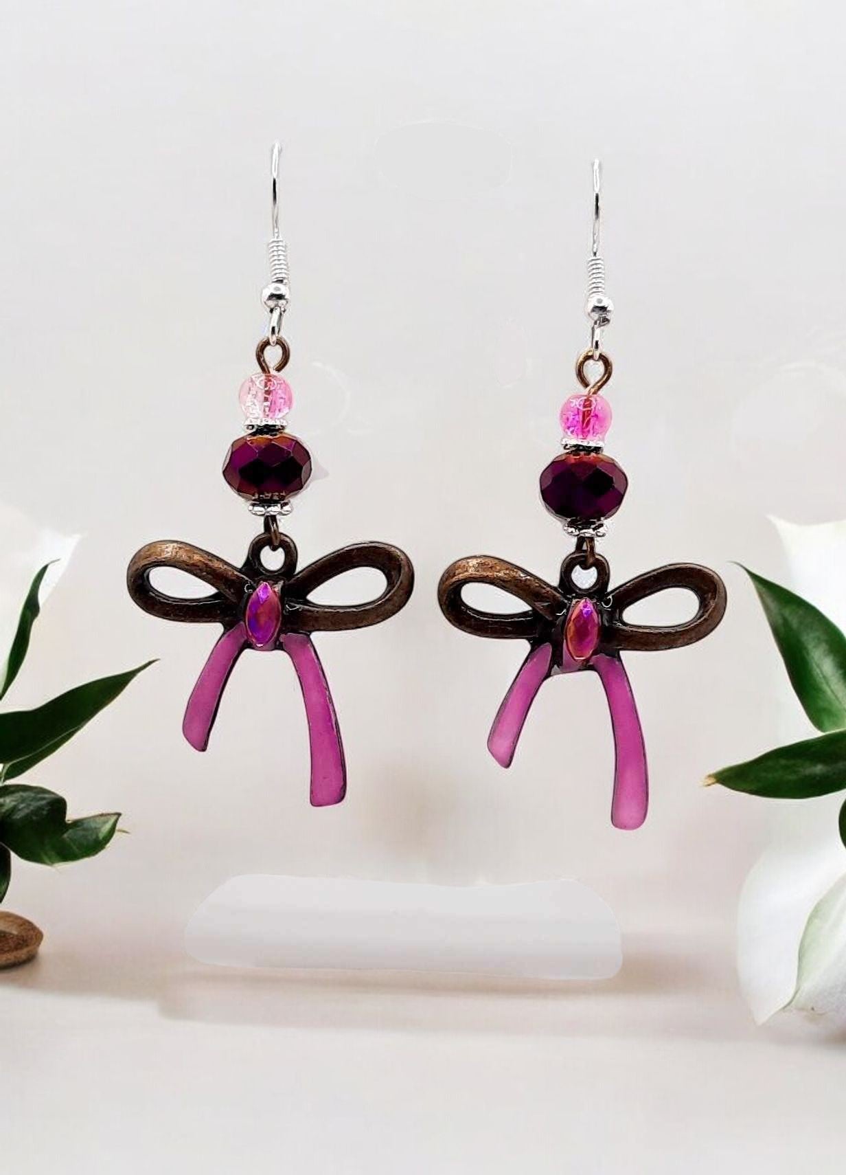 Pink and bronze bow earrings with Glass beads 2.25inches