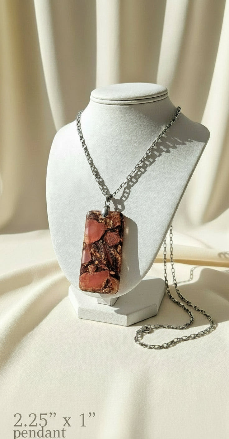 Necklace with a rectangular pendant featuring a natural pattern on a white background
