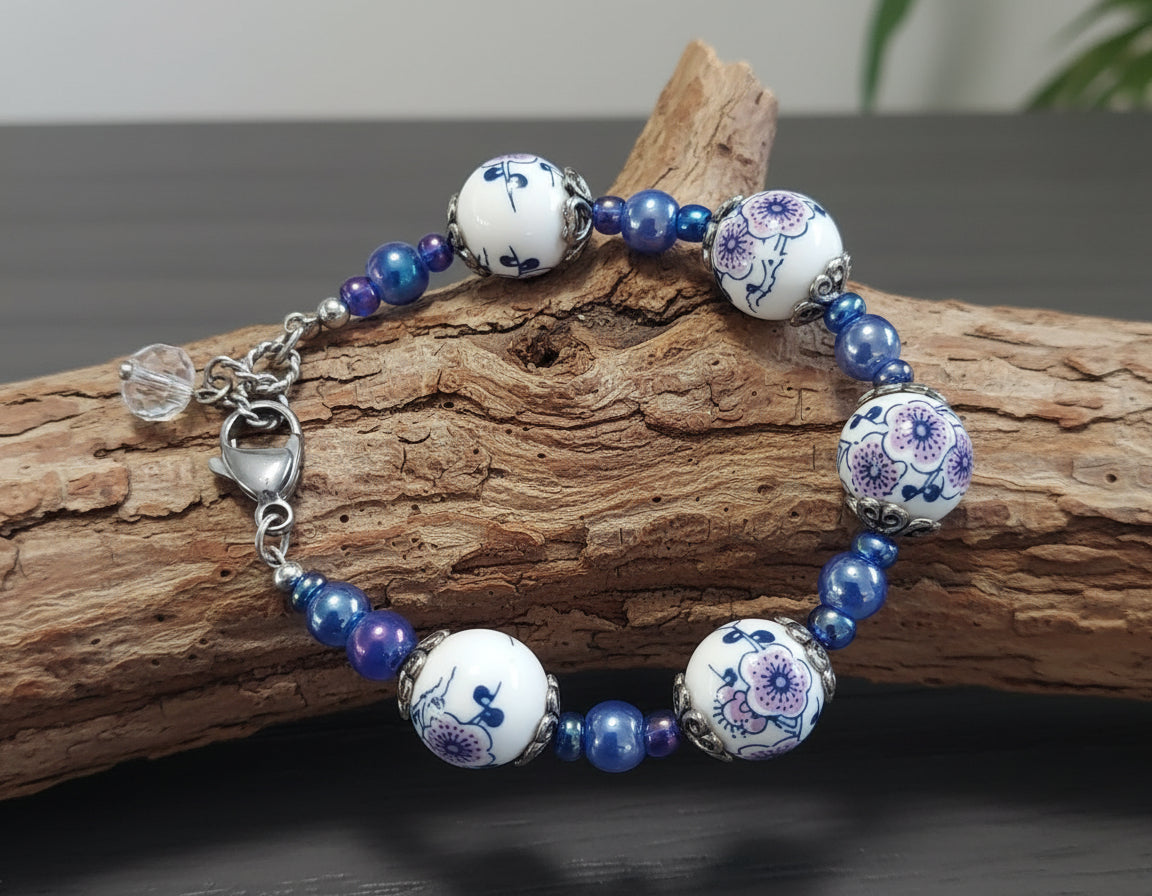 Bracelet with floral beads on a wooden log