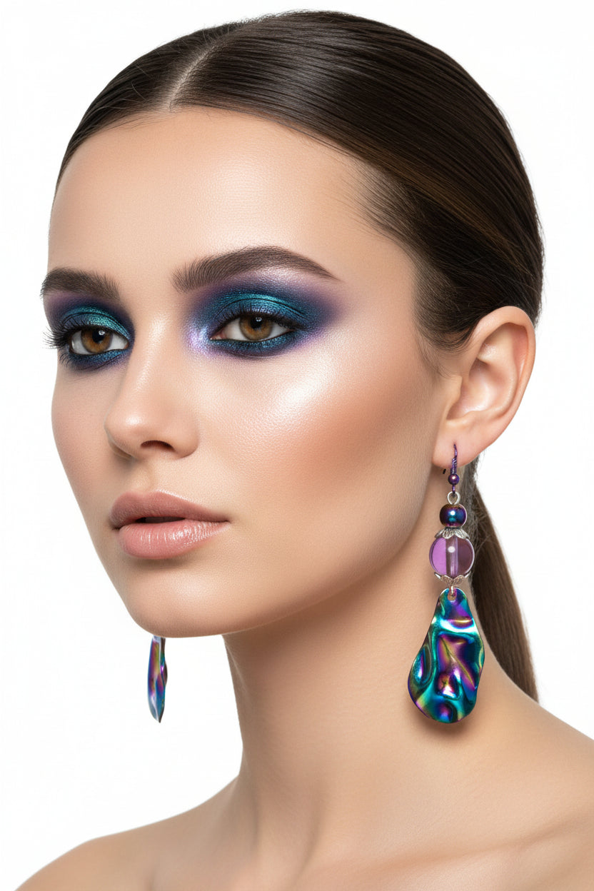 Multicolored teardrop earrings with purple beads on a white background