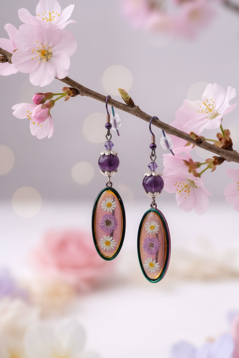 Jewelry set with earrings and a necklace on a floral background