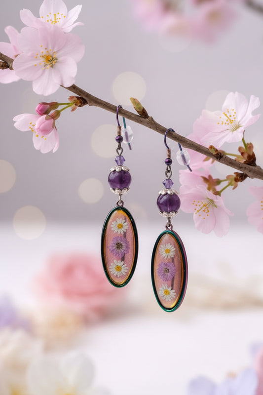 Jewelry set with earrings and a necklace on a floral background