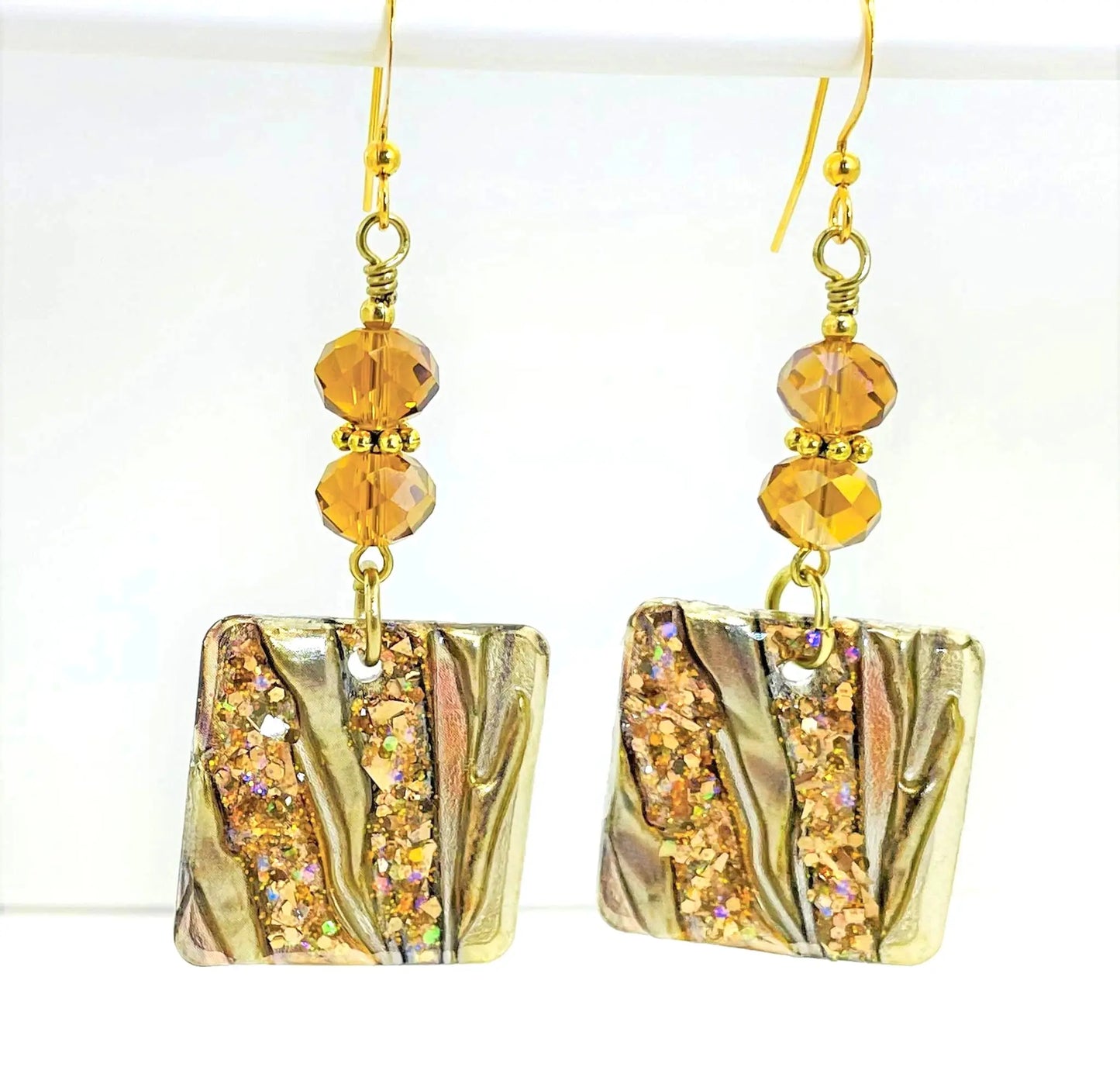 Gold plaid earrings by Linda - Image #1