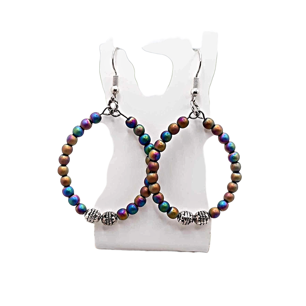 Multicolored beaded hoop earrings on a white mannequin bust.